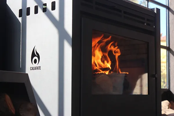 Tromen heater with lighted fire